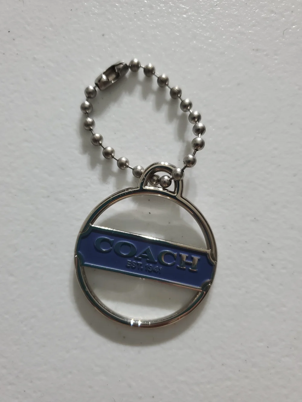 Coach Round Keychain with Blue Accent
